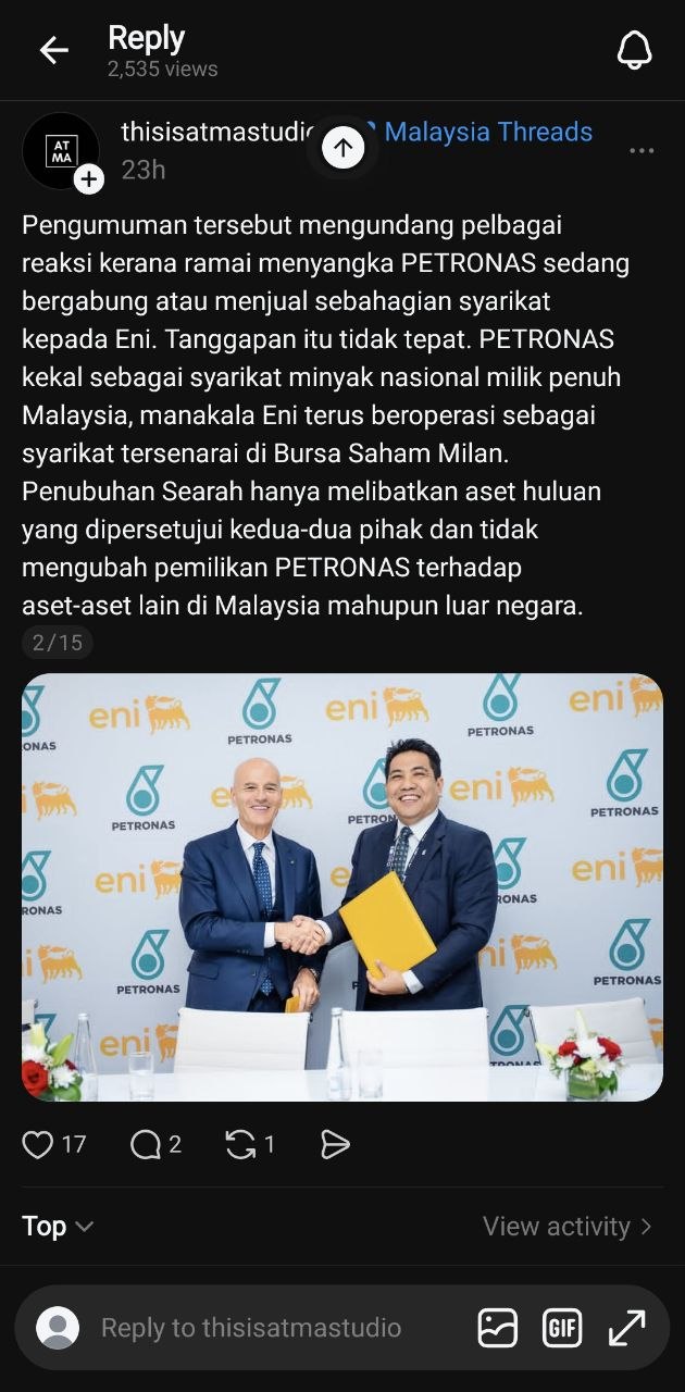 Threads post by @thisisatmastudio — 15-slide PR defending PETRONAS SEARAH deal. Slide 2/15: 'PETRONAS kekal sebagai syarikat minyak nasional milik penuh Malaysia.' Shows two men shaking hands at PETRONAS-Eni signing ceremony.